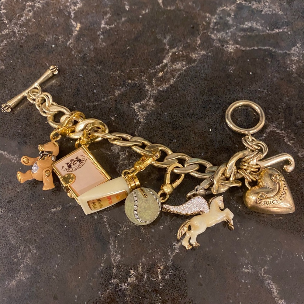 Juicy couture charm bracelet with 5 charms